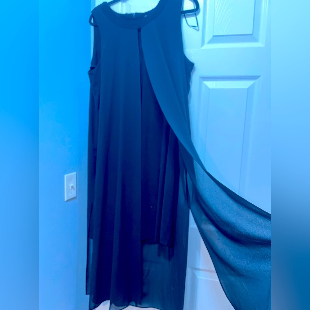 Beautiful black, simple, and elegant dress for holidays, parties etc…,